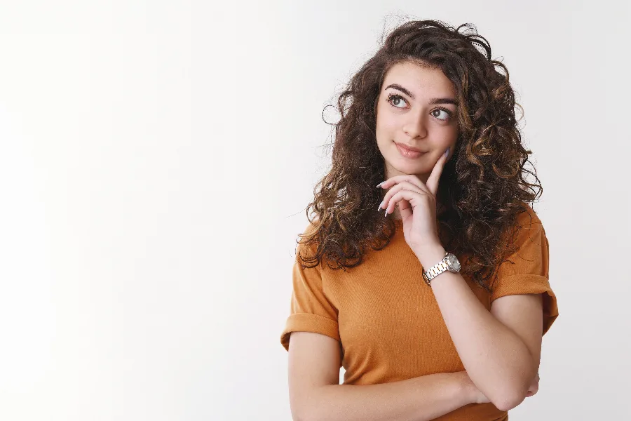 A woman choosing a hosting plan for her website